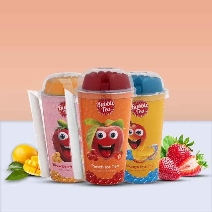 Three bottled fruit-flavored teas with lemon, strawberry, and black tea ingredients, accompanied by paper straws and plastic cups.